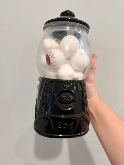Halloween gumball machine with eyeballs decor