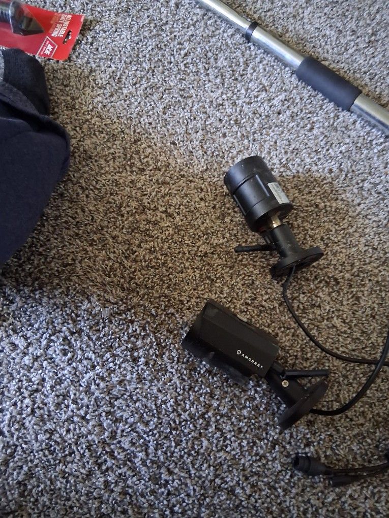 Two AMCREST SECURITY CAMERAS
