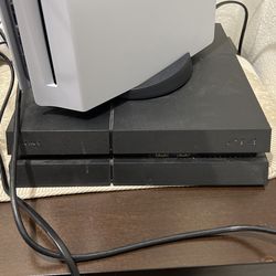 PS4  And Two Controllers 