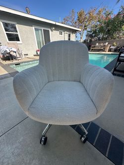 Cream Upholstered Swivel Office Chair