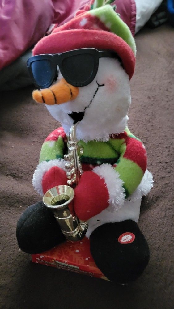 Plays 2 Songs Snowman SAX For Christmas