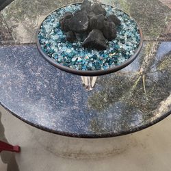 Beautiful granite fire pit with cover