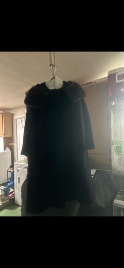 Coat with fur collar