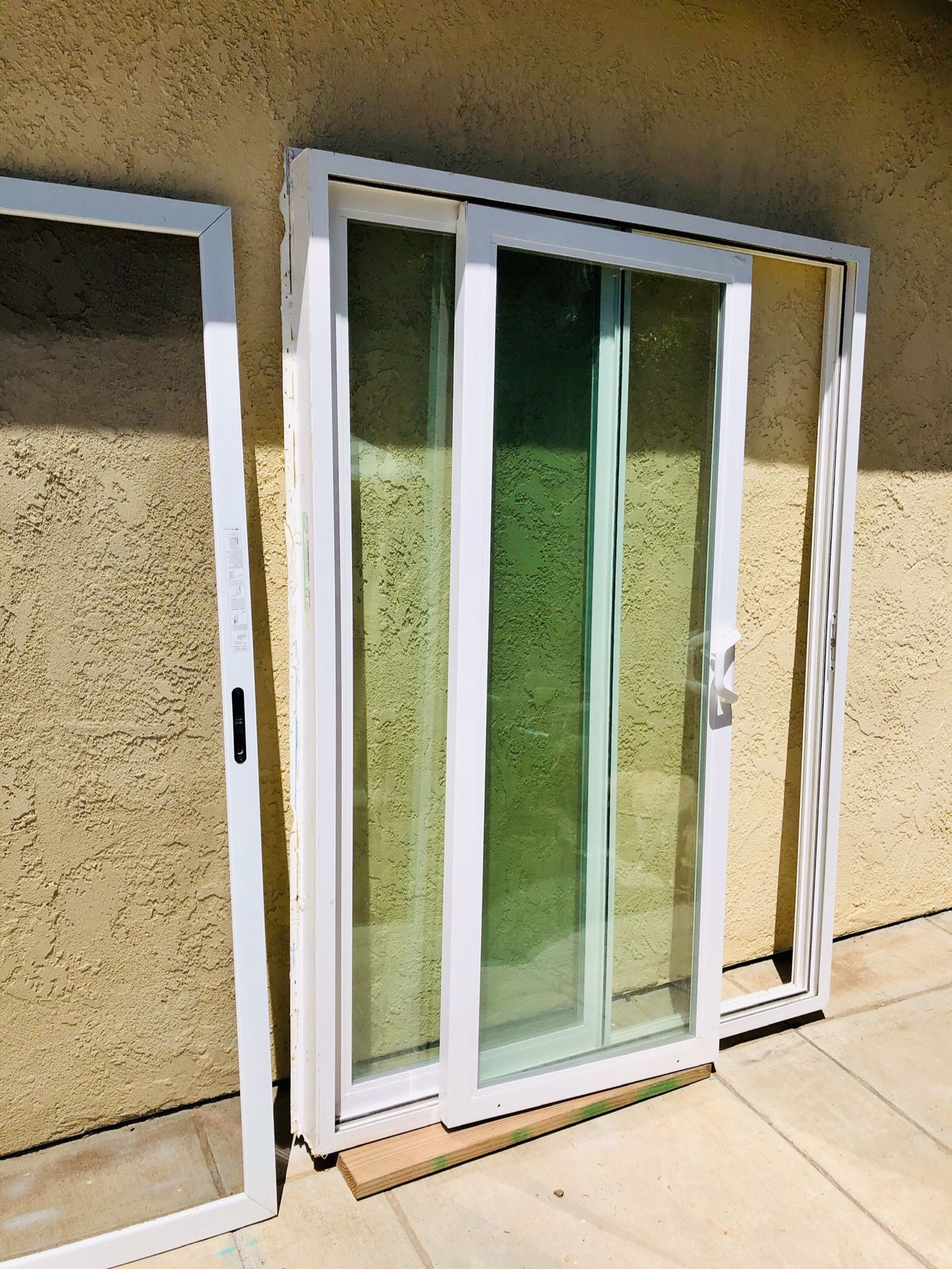 Used MILGARD Sliding Glass Door, Right, 57 1/2 x 78. 1/2 with 2 feet Slider