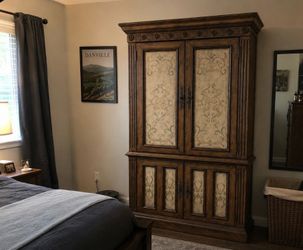 Large Wood Armoire with Decorative Panels