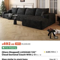 Couch and entertainment center with fire place