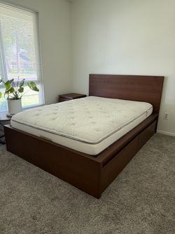 Full bed with mattress and nightstand