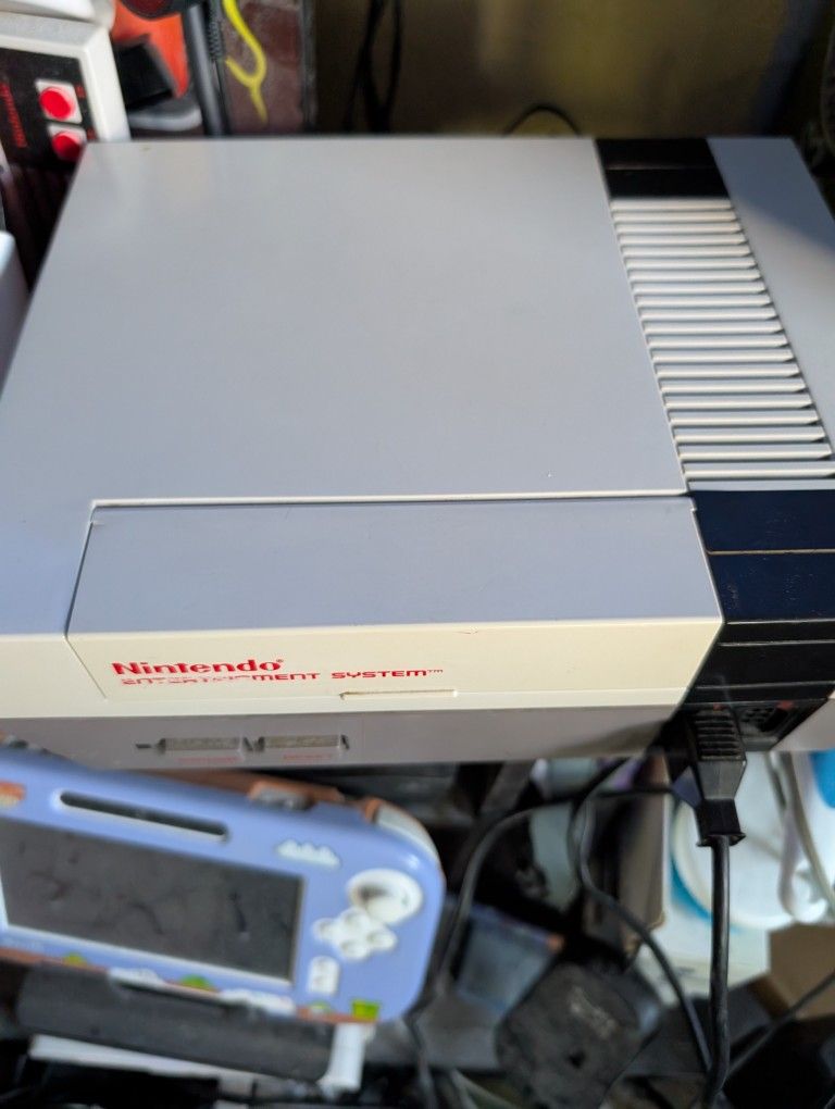 Nintendo Entertainment System with 3 games and 2 controllers