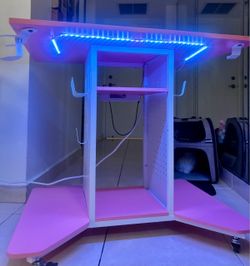 Pink LED desk with wheels