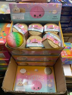Rainbow dumping bun squishy