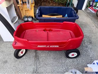 Radio Flyer All-Terrain Pathfinder Wagon with 2-in-1 convertible seats.