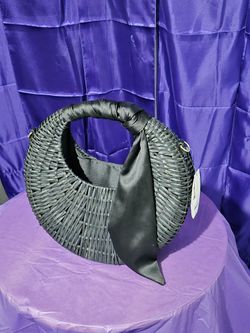 Large straw crescent cross body bag