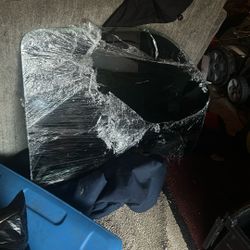 passenger side tinted window came out of 05 tahoe