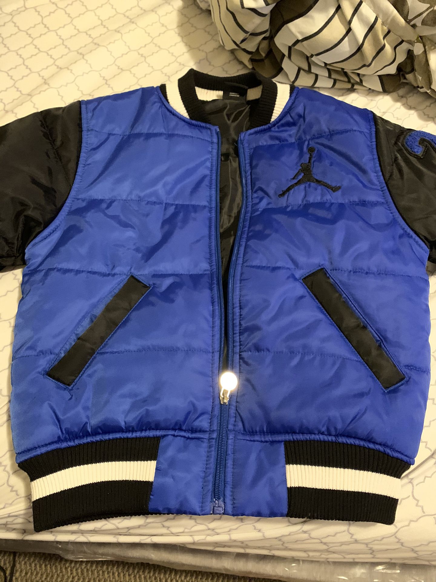 Brand new no tag Jordan jacket for kids size 8/10