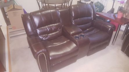 Brown leather sofa set, 2 months old, moving and money needed. In great condition!
