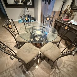 Glass top table and 6 chairs