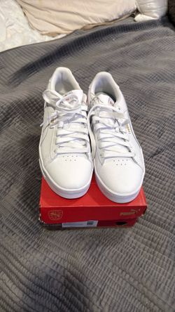 New women’s white Puma court sneakers size 9