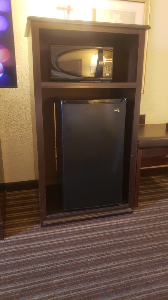 Fridge, Microwave And The Cabinet