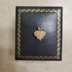 14 K Gold Diamond Pendant.  Weight Is 1.5 Grams