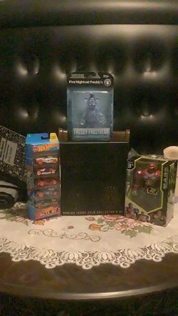 Four unopened boxes, collection of toys