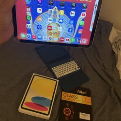 I pad A16 128 GB, includes charger, original box, and Bluetooth keyboard!!!!