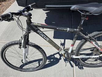 Focus Black Hill Mountain Bike and a motocross bike