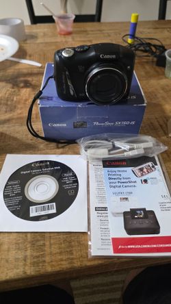 PowerShot SX150 is 14.1 MP Digital Camera with 12x Wide-Angle Optical Image Stabilized Zoom with 3.0-Inch LCD (Black) (Old Model)