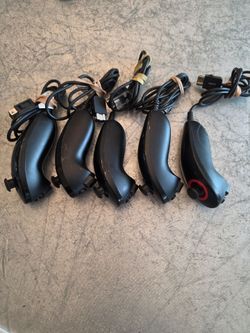 Black Nintendo Wii nunchuck controllers