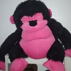 giant black and pink stuffed animal