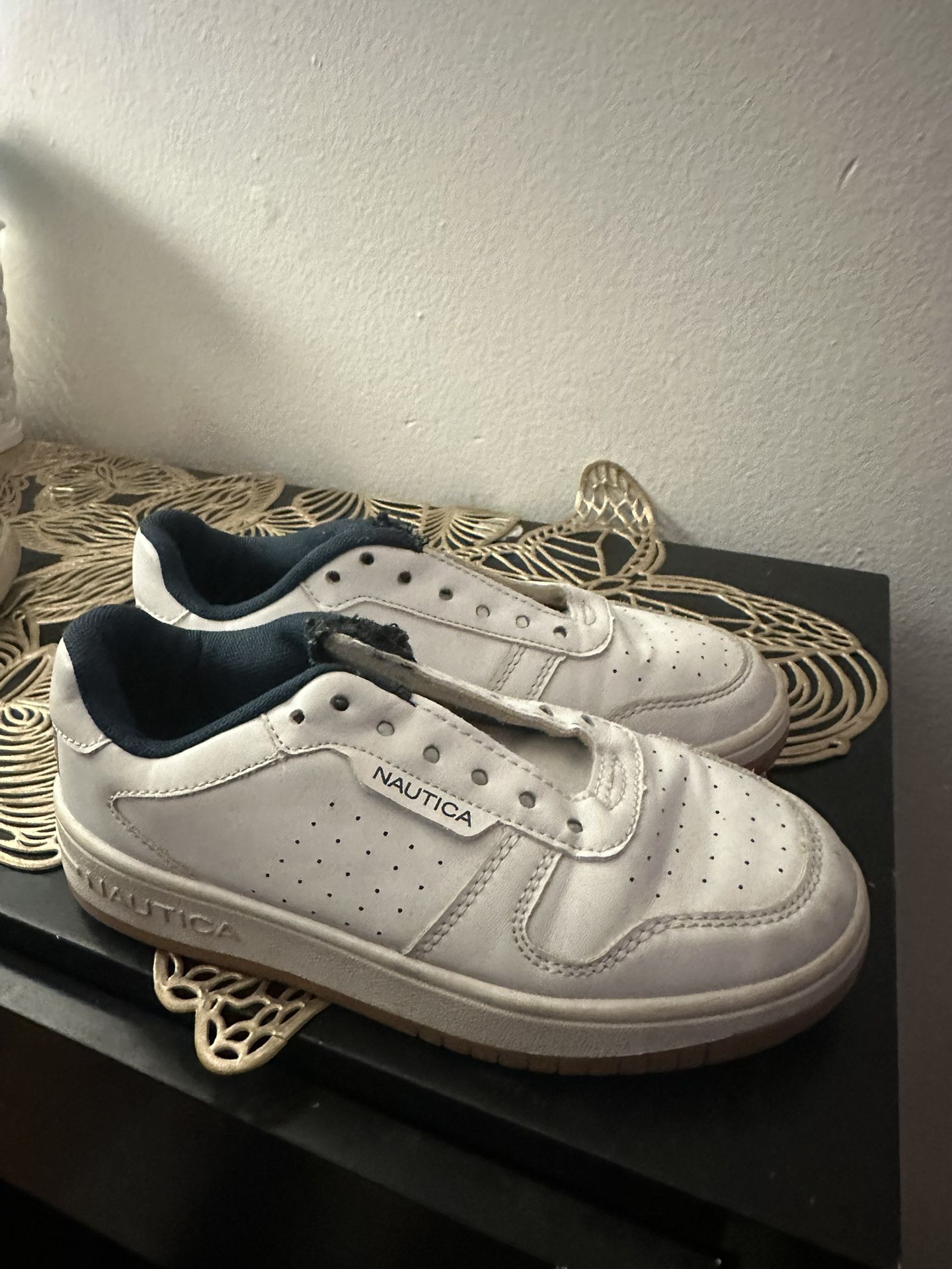 Blue and White Nautica Kid Shoes.