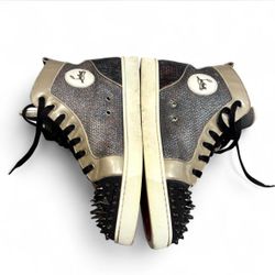 Luxurious Christian Louboutin spiked leather sneakers in black and gold Size 11