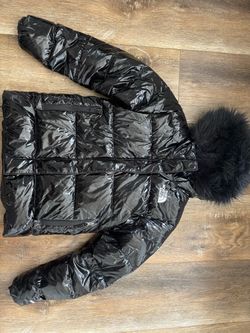 Girls size 10 the north face jacket in perfect condition