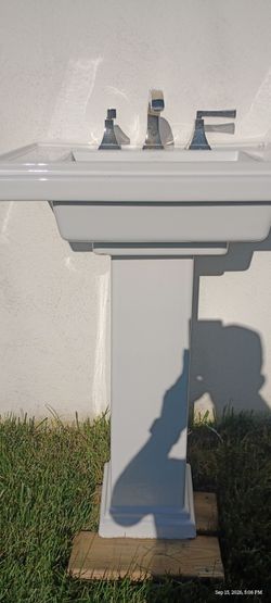 White Ceramic Pedestal Sink with Chrome Faucet