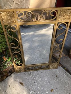 Gold Tone Mirror with 4 Medallions in Design 30” H x 22” W