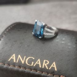 Beautiful Blue Topaz Engagement Ring 