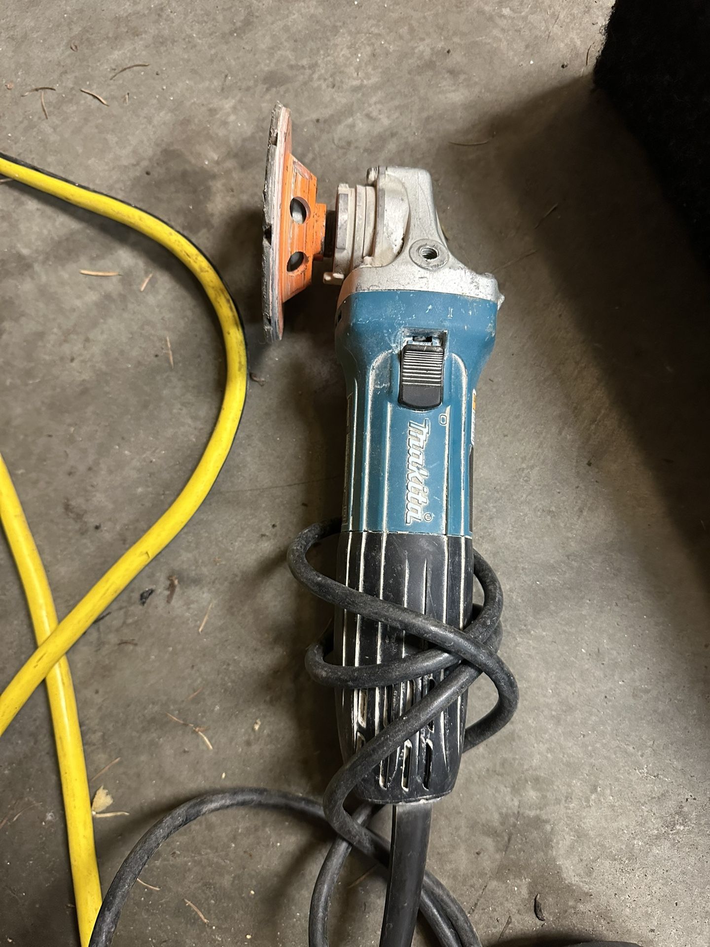 Makita GA4030 compact 4-inch angle grinder. 