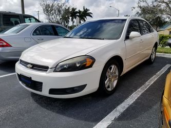CHEVY IMPALA! LEATHER. COLD AIR RELIABLE!