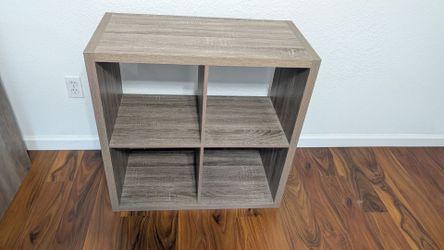 Four quadrant shelving unit