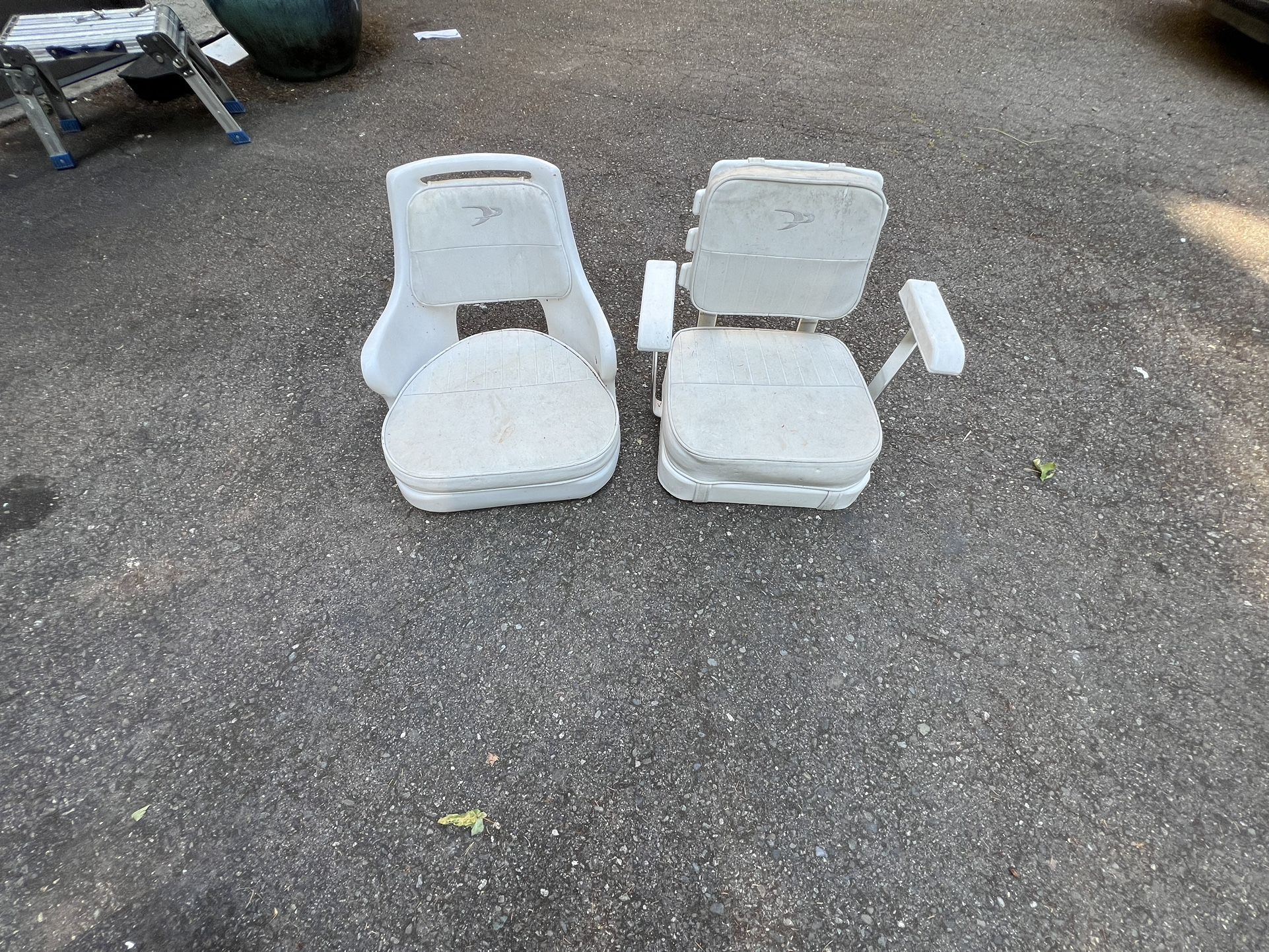 Two Wise Pedestal Boat Chairs.
