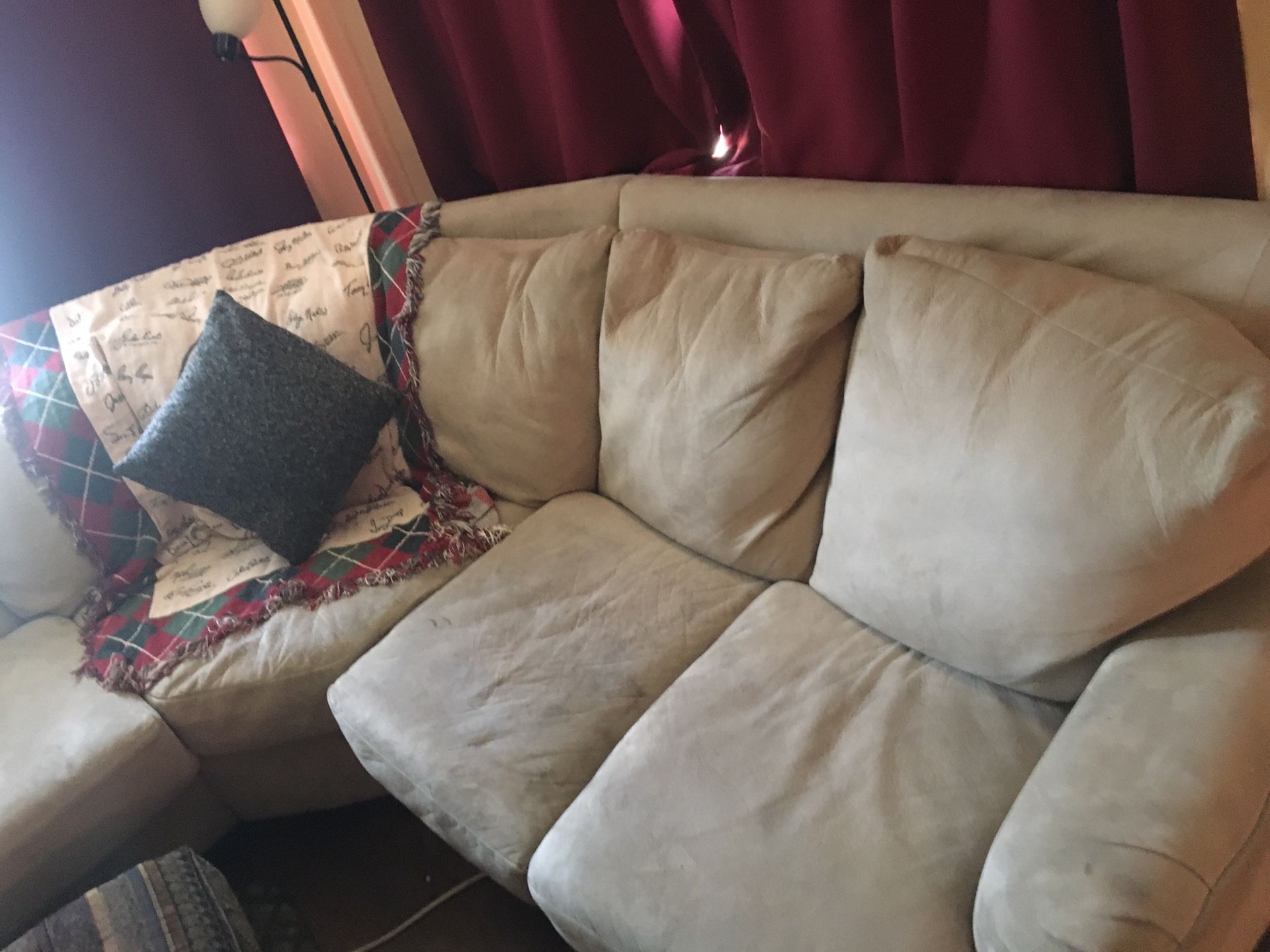 Large “half moon” shaped couch.