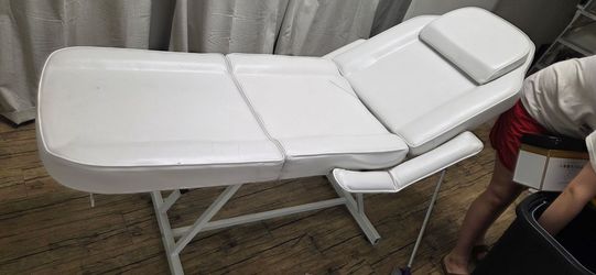 Massage table