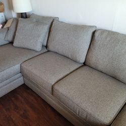 Raymore Flanagan Two Peice Sectional Couch