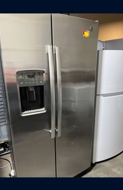 NEW G.E Side By Side Refrigerator