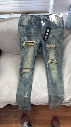 Distressed Light Wash Slim Fit Jeans