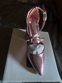 Female pink shiny heels