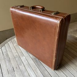 Three Vintage Leather Suitcases