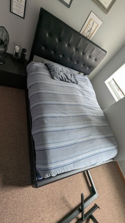 Black leather frame full sized bed and mattress