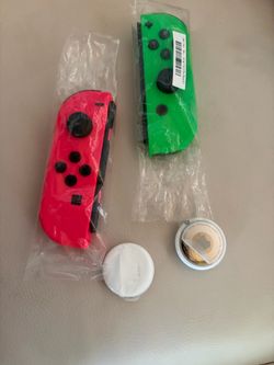 Nintendo Switch controller Neon Red and Green air tags (send offers)