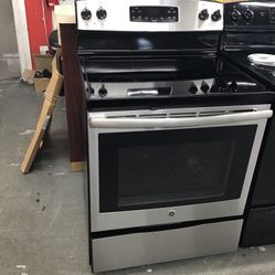 GE 4 Burner Glass Top Stainless Steel Range. 1 year Warranty 