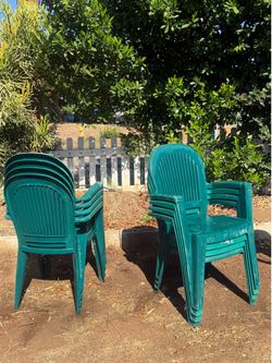 8 green chairs